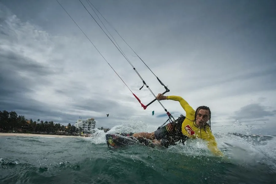 Kitesurfer riding in the waves